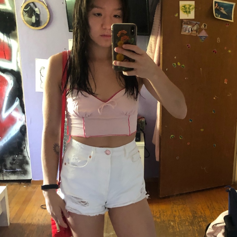 White high waisted denim shorts.